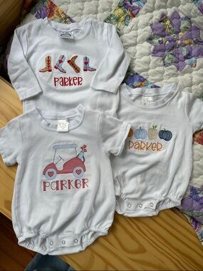 White Baby One-Pieces with Red and Blue Embroidery